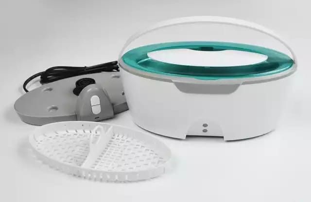 Aparato de limpieza por ultrasonido